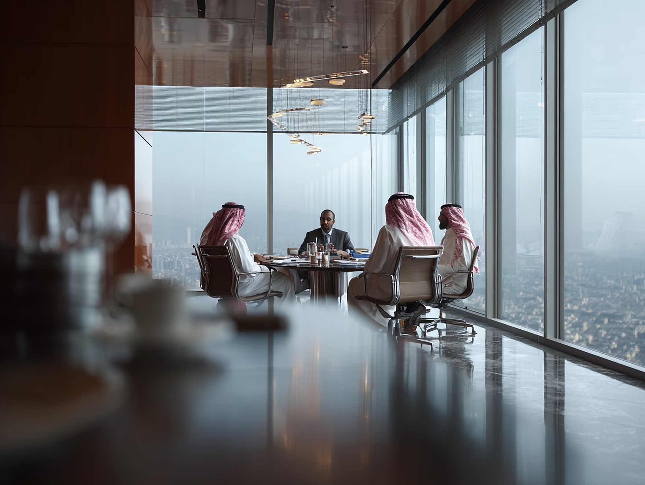 A working session in a meeting room above Riyadh